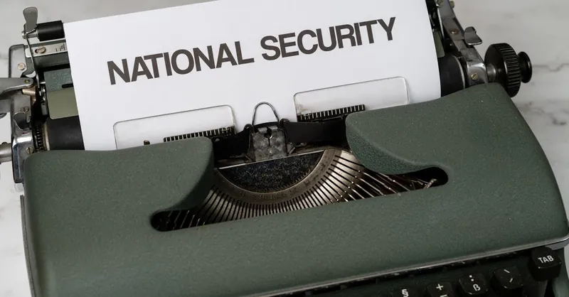 Close-up of a vintage typewriter with a paper marked