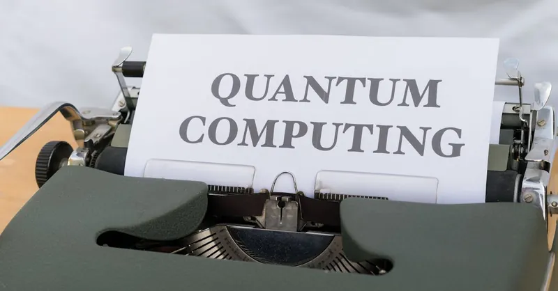 A vintage typewriter with a paper displaying the term Quantum Computing.